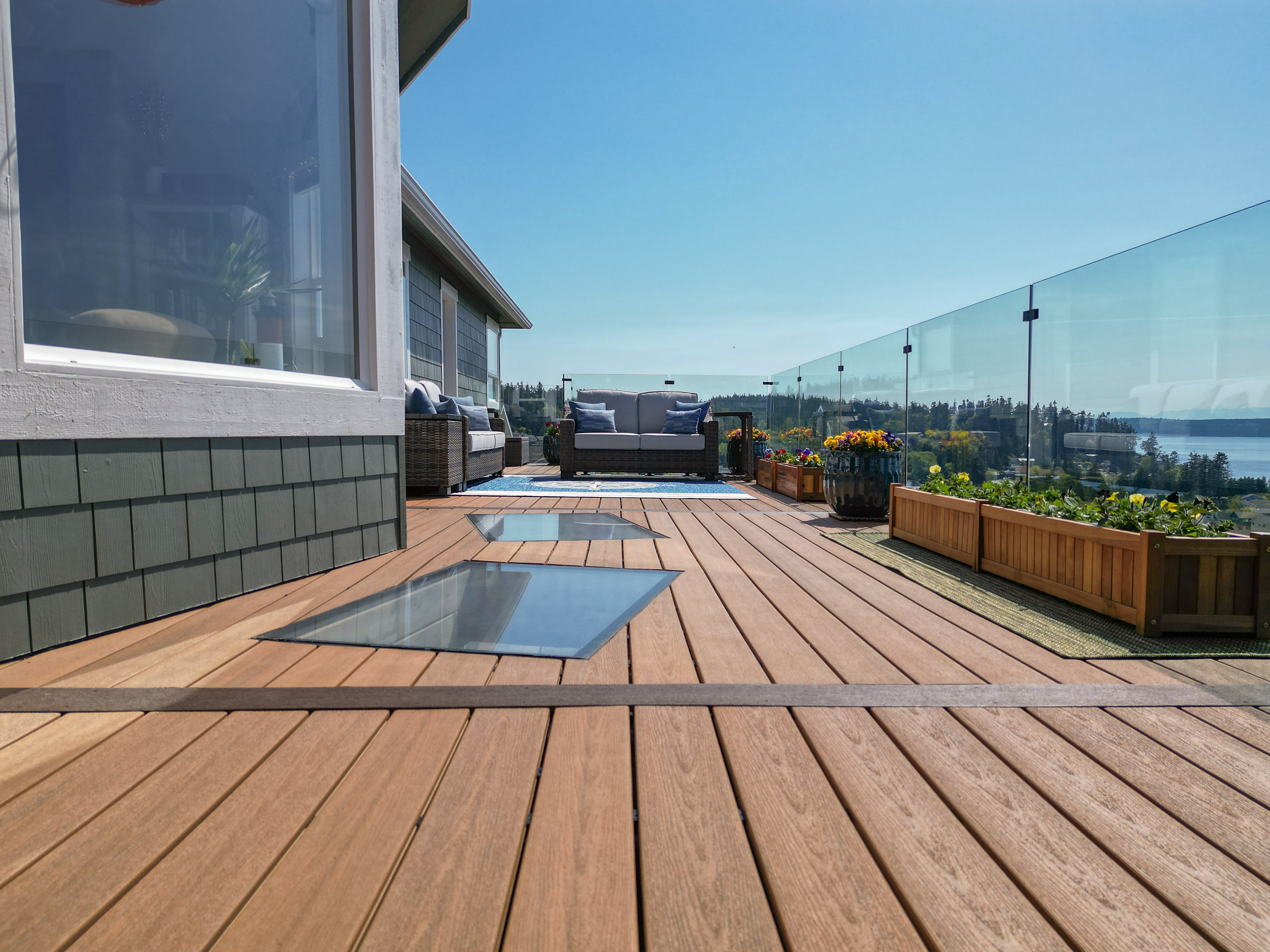 Beautiful waterfront deck with glass railing